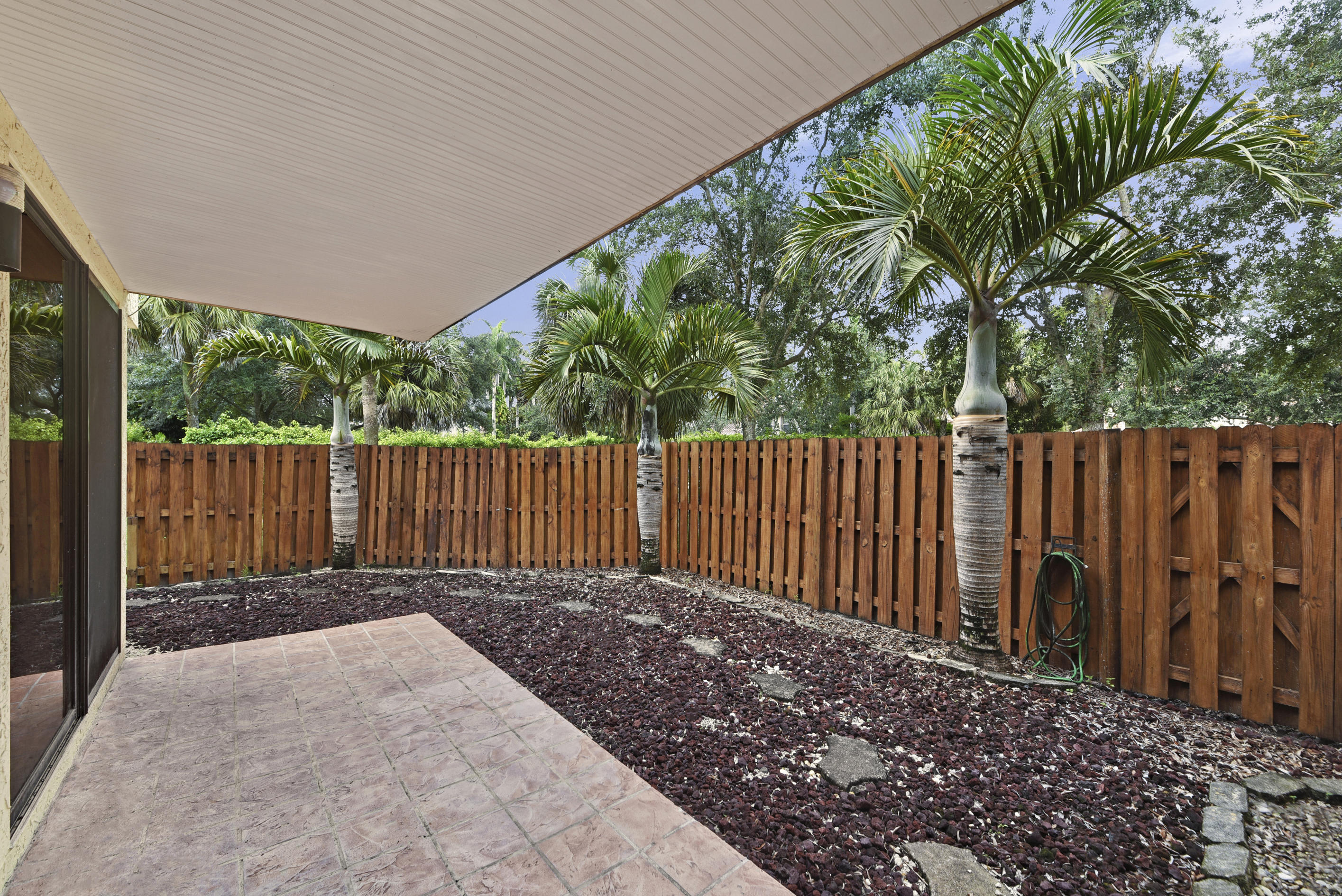 5705 Fox Hollow Drive, Unit B Boca Raton, FL 33486 - Photo 15 of 15 Fenced Private Covered Patio