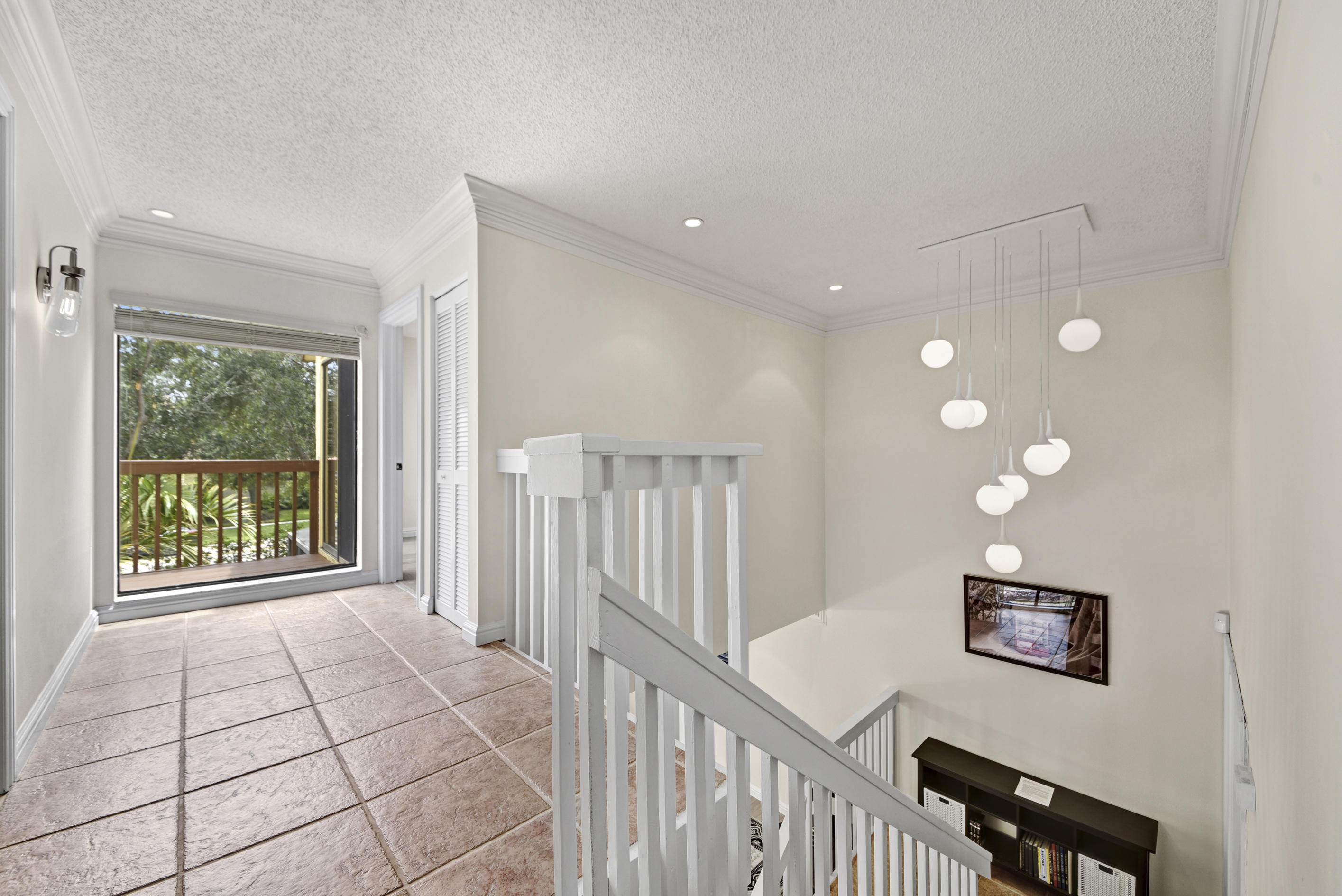 5705 Fox Hollow Drive, Unit B Boca Raton, FL 33486 - Photo 9 of 15 Landing Area Upstairs