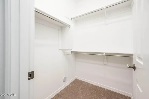 a bathroom with a sink double vanity and a mirror