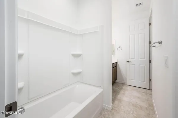 a bathroom with a bathtub