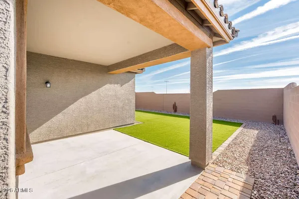 a view of a backyard with a area