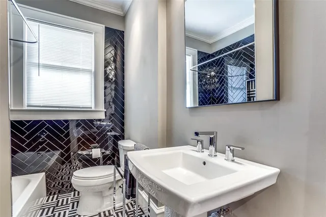 a bathroom with a sink and a toilet