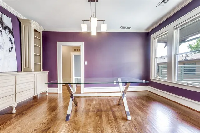 a view of livingroom with furniture wooden floor and windows