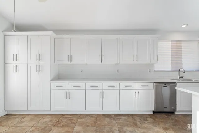 a view of a kitchen with a sink