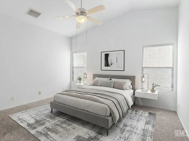 an empty room with windows and closet