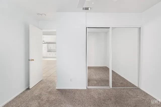 a view of a bathroom from a hallway