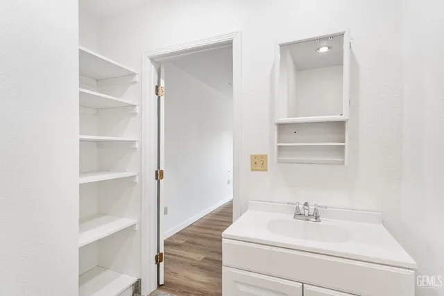 a view of a patio with couches and potted plants