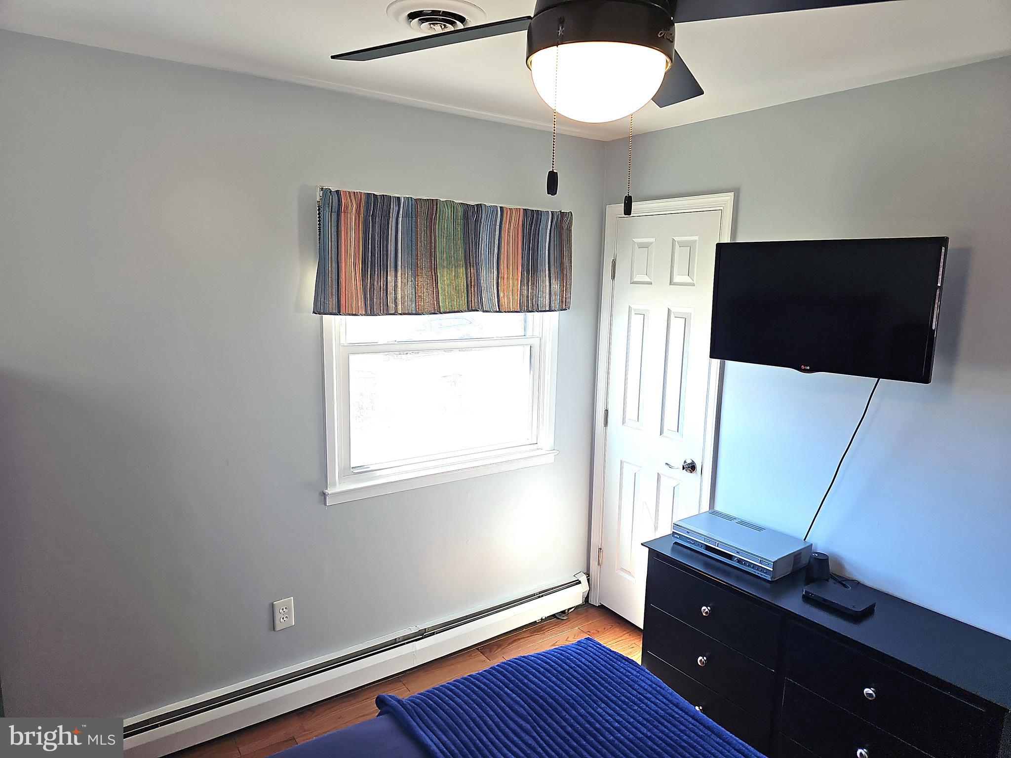 14143 Grayson Road Woodbridge, VA 22191 - Photo 39 of 58 Bedroom #2. Lots of light.