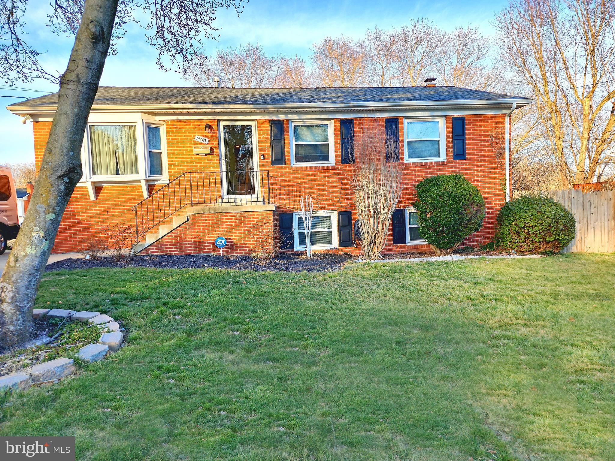 14143 Grayson Road Woodbridge, VA 22191 - Photo 6 of 58 Front of 5 bedroom, 2.5 bath brick home.