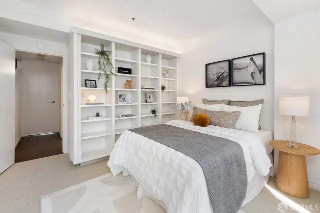 a bedroom with a bed and closet