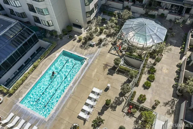 a view of a building with potted plants