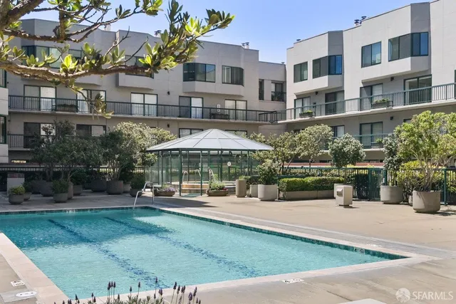 a patio with table and chairs