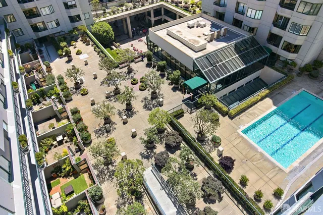 a view of a porch with potted plants