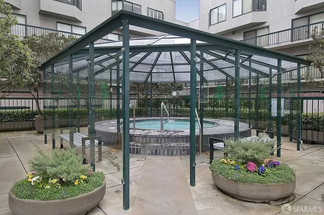 a view of a room with wooden floor and utility