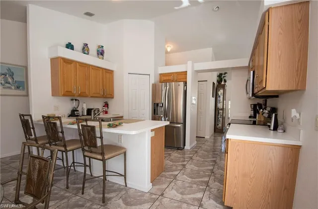 a room with furniture a washer and dryer