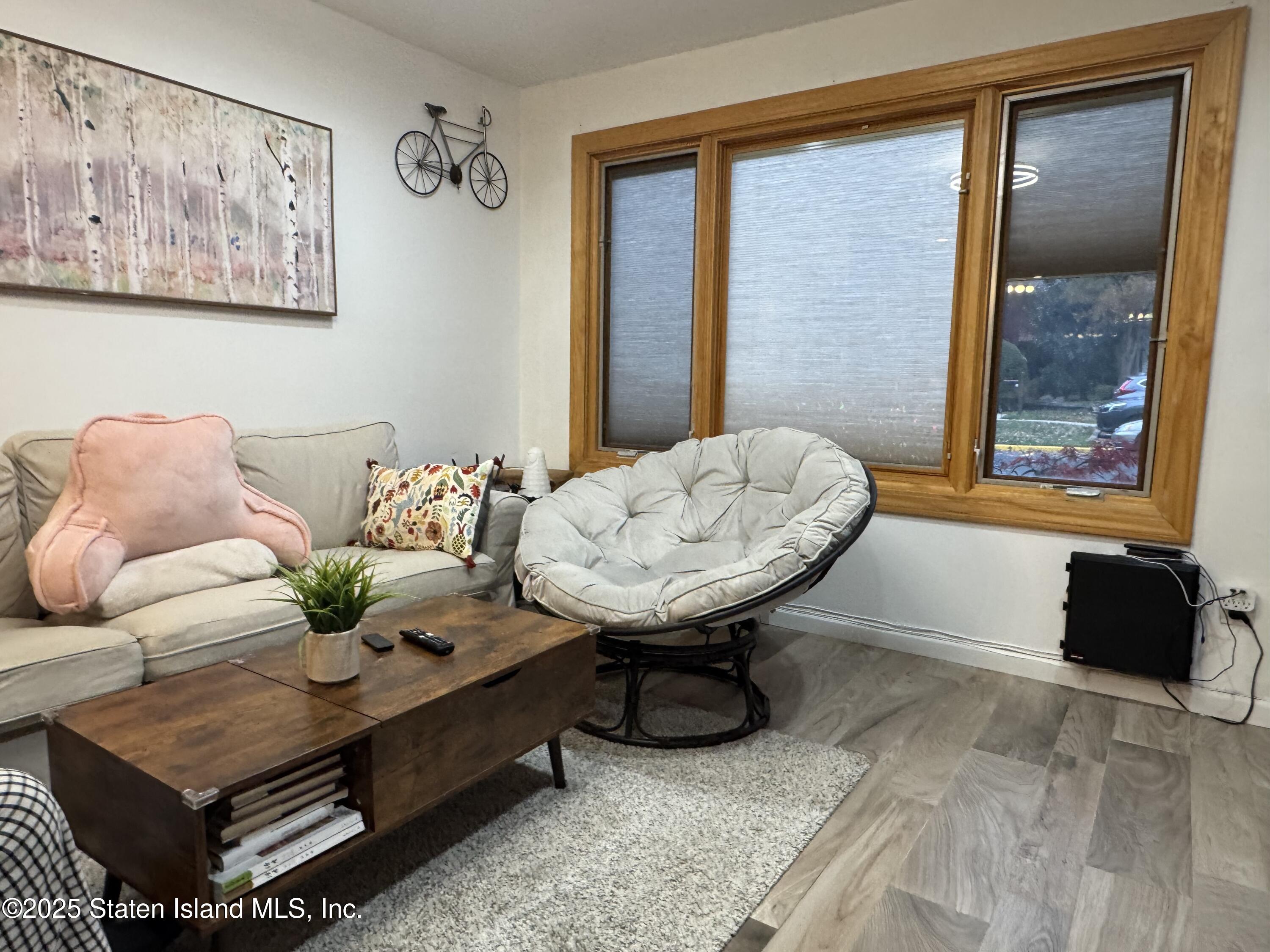 31 Pierpont Place Staten Island, NY 10314 - Photo 14 of 23 a living room with furniture and a window