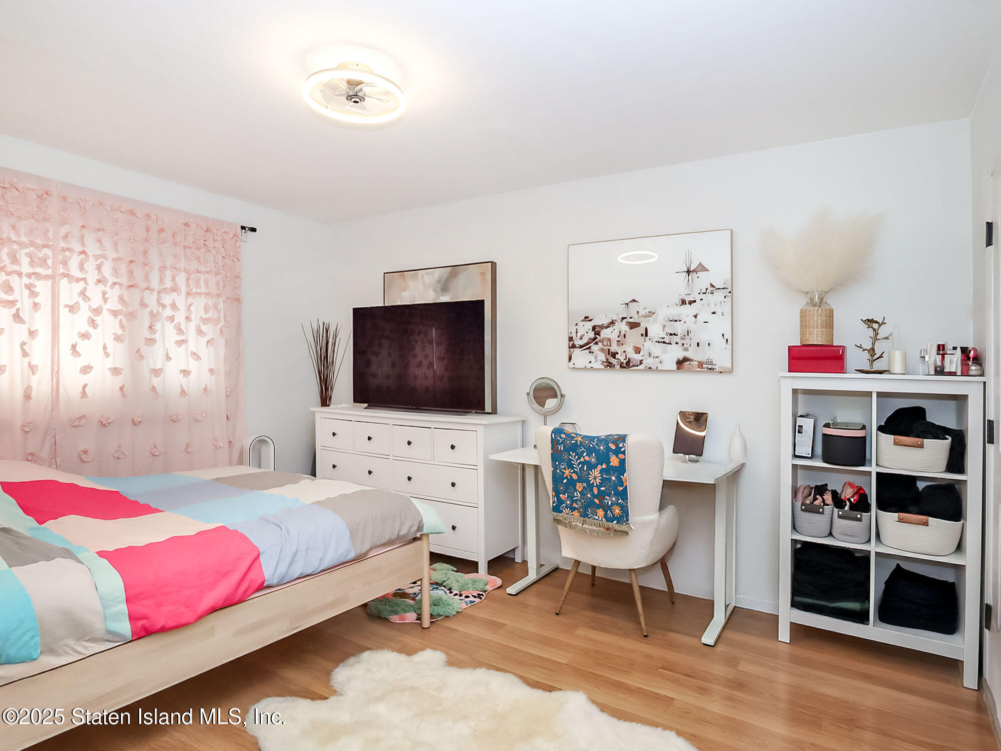 31 Pierpont Place Staten Island, NY 10314 - Photo 15 of 23 a bedroom with a bed and a flat screen tv