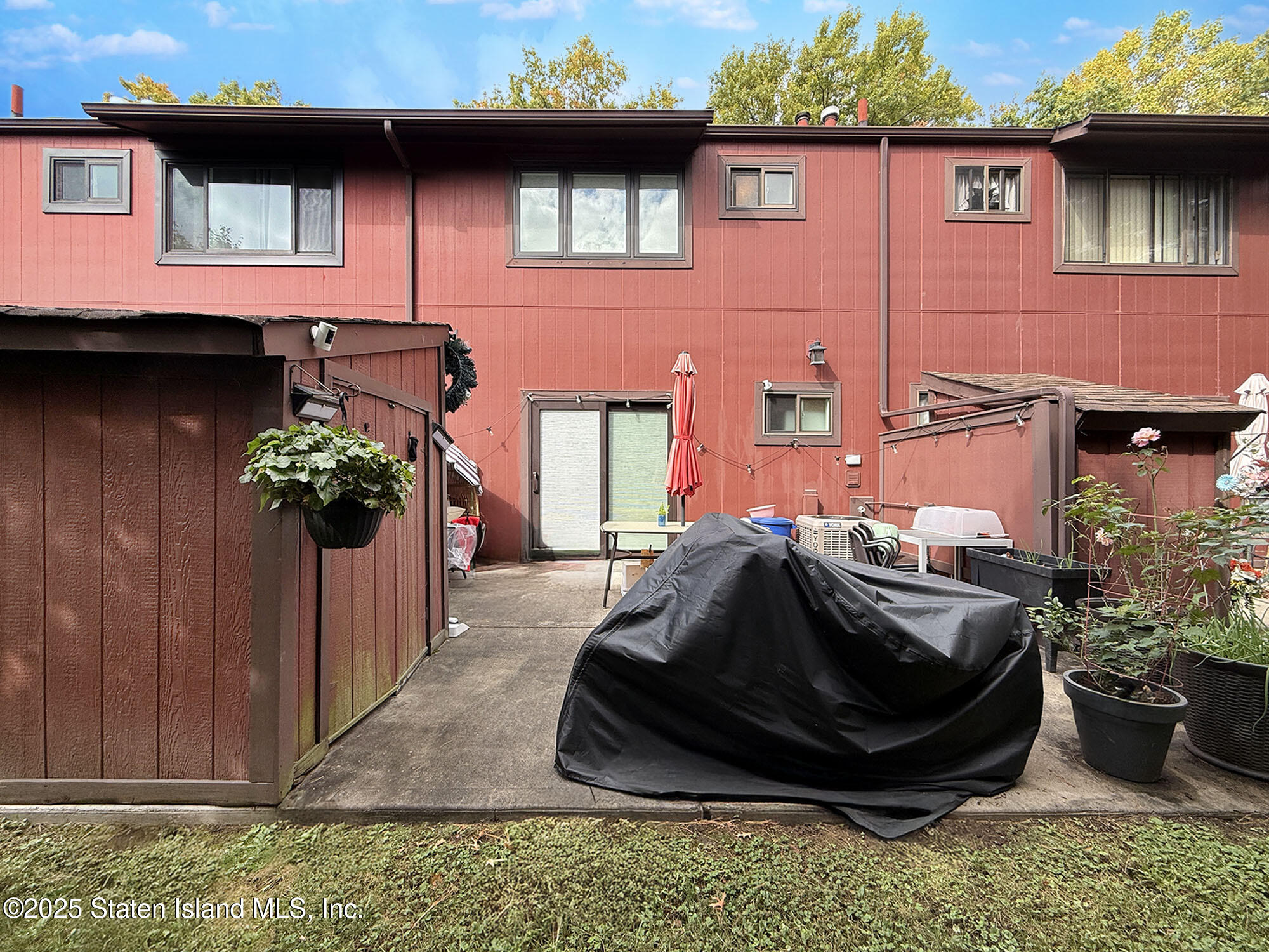 31 Pierpont Place Staten Island, NY 10314 - Photo 19 of 23 a front view of a house with yard