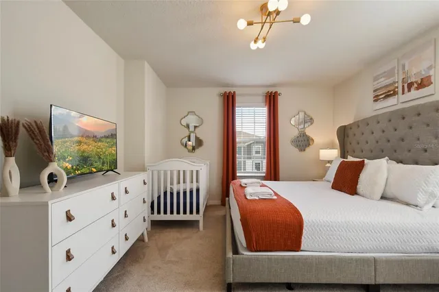 a view of a house with swimming pool and a yard