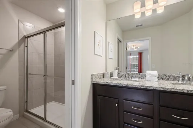 an aerial view of a pool patio swimming pool and outdoor seating