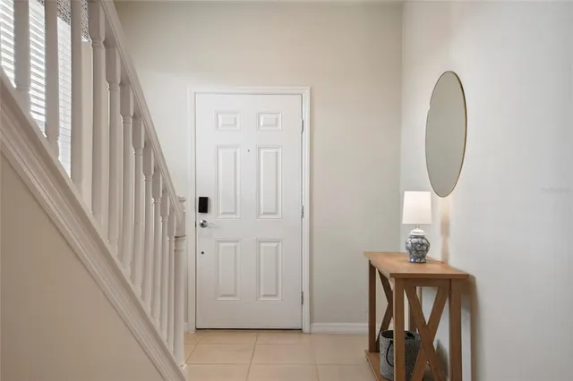 a kitchen with lots of counter top space and stainless steel appliances