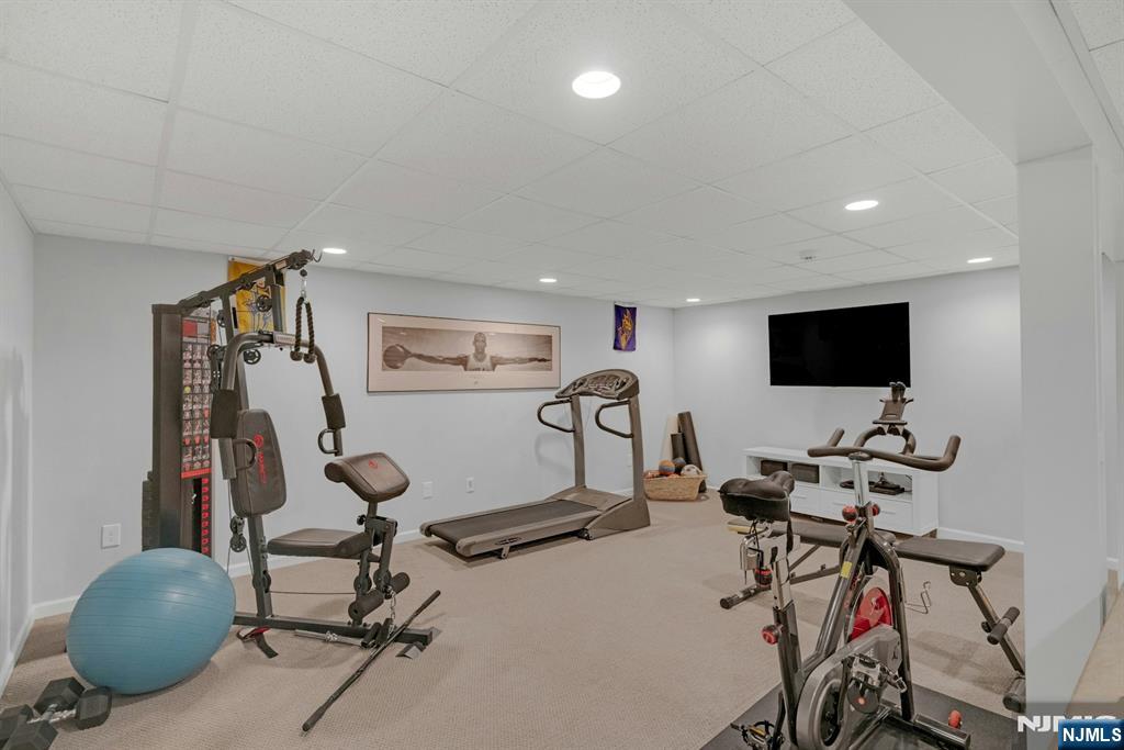 48 Hopper Farm Road Upper Saddle River, NJ 07458 - Photo 35 of 43 a view of a room with gym equipment