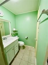 1220 Winnie Rear Street Galveston, TX 77550 - Photo 8 of 10 a bathroom with a granite countertop toilet and a sink