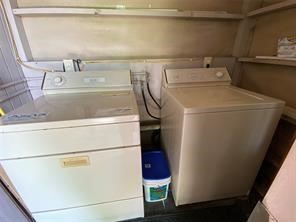 1220 Winnie Rear Street Galveston, TX 77550 - Photo 10 of 10 a utility room with dryer and washer