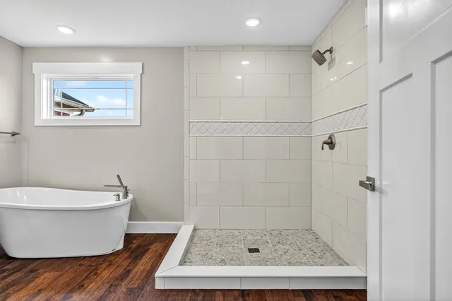 a view of a bathtub in a bathroom