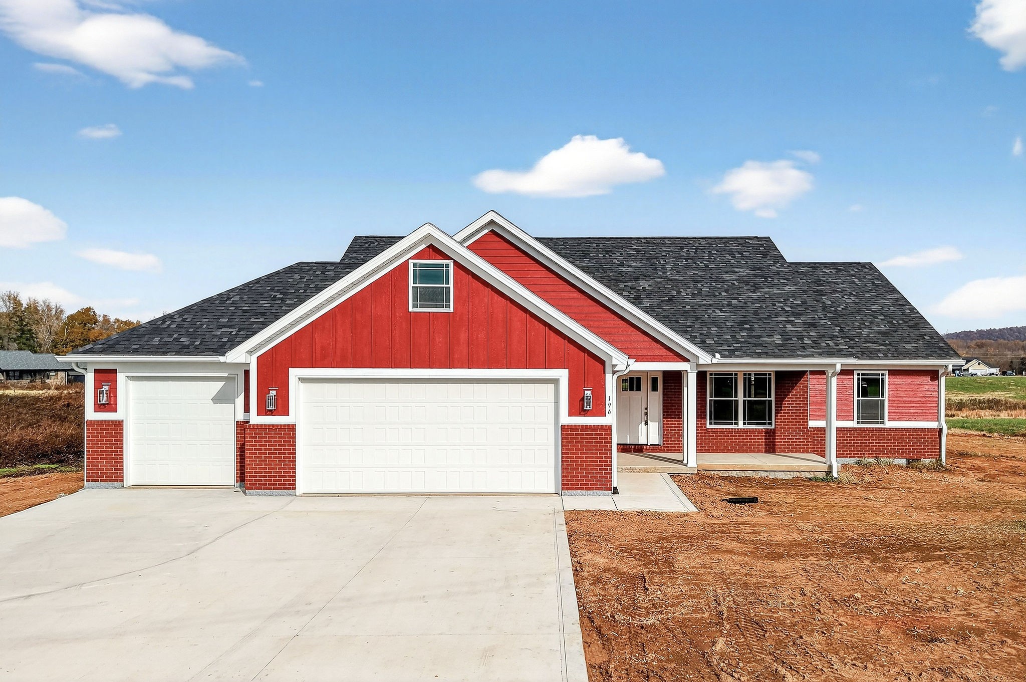 196 Dairy Barn Road Sparta, TN 38583 - Photo 4 of 44 a front view of a house with a yard