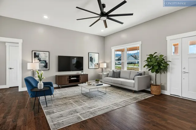 a living room with furniture and a flat screen tv