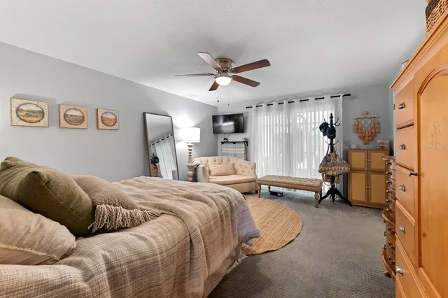 a bed room with a bed and a couch