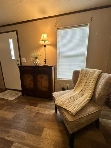 a bathroom with a toilet and a tub