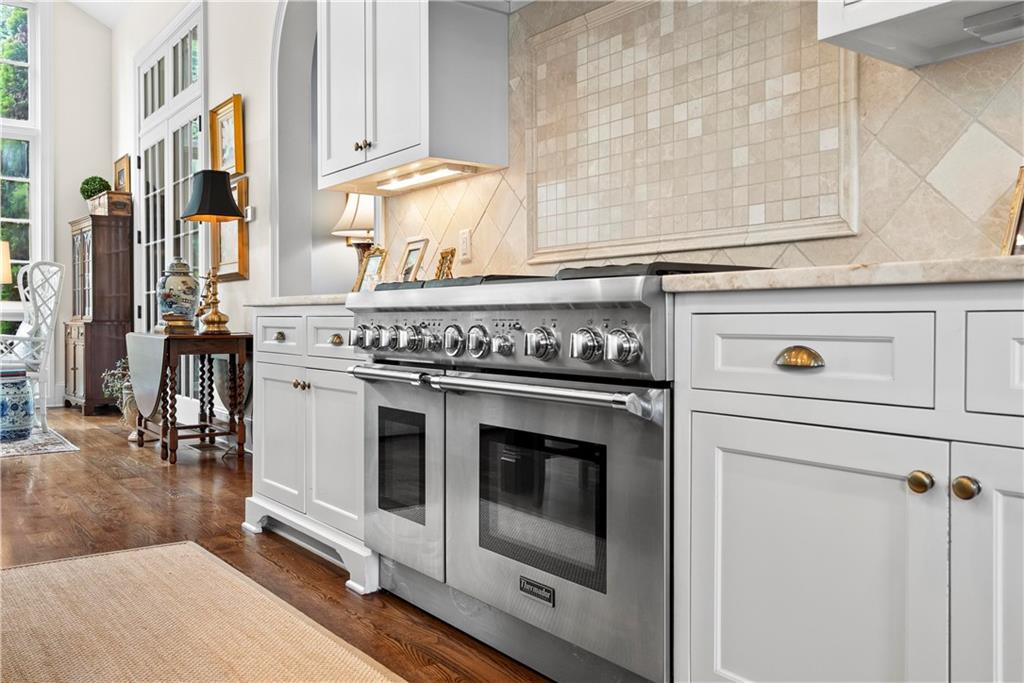 315 East Line Street Calhoun, GA 30701 - Photo 28 of 71 a stove top oven sitting inside of a kitchen