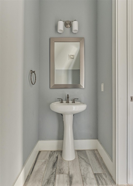 2113 Solstice Boulevard Spring, TX 77386 - Photo 13 of 50 a bathroom with a sink toilet and mirror