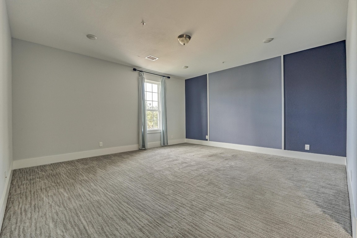 2113 Solstice Boulevard Spring, TX 77386 - Photo 40 of 50 a view of an empty room with wooden floor