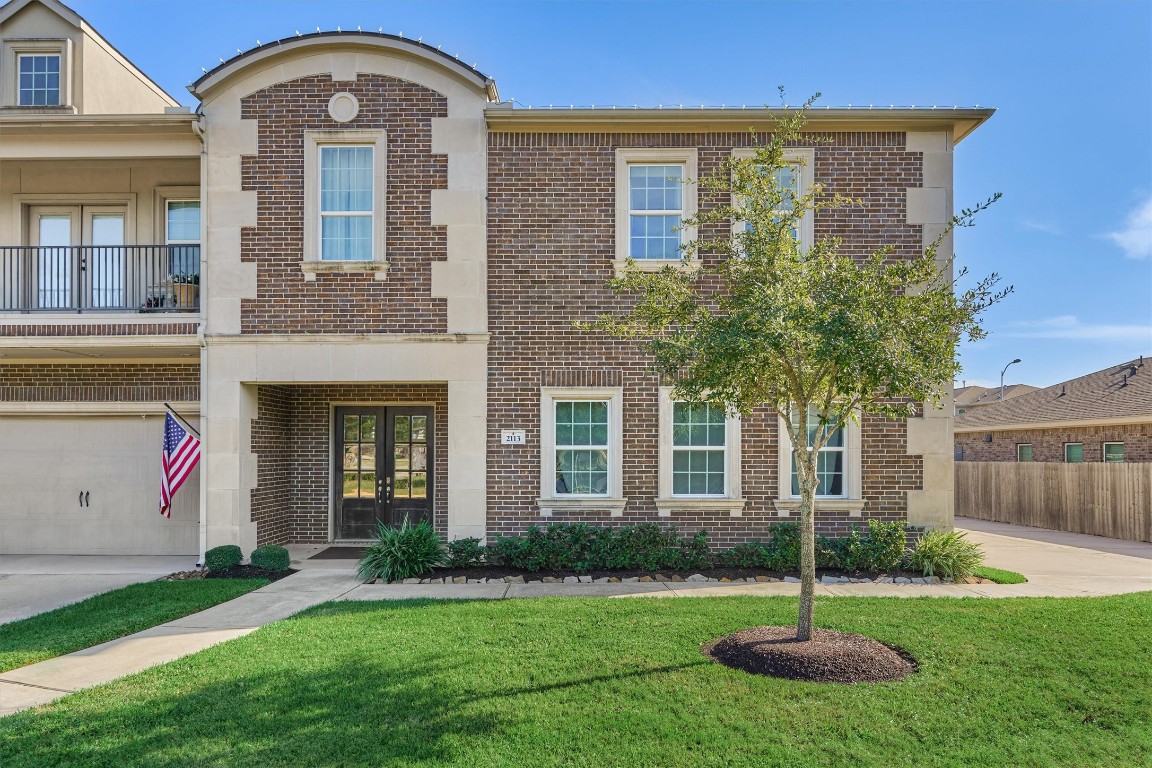 2113 Solstice Boulevard Spring, TX 77386 - Photo 6 of 50 a front view of a house with a garden