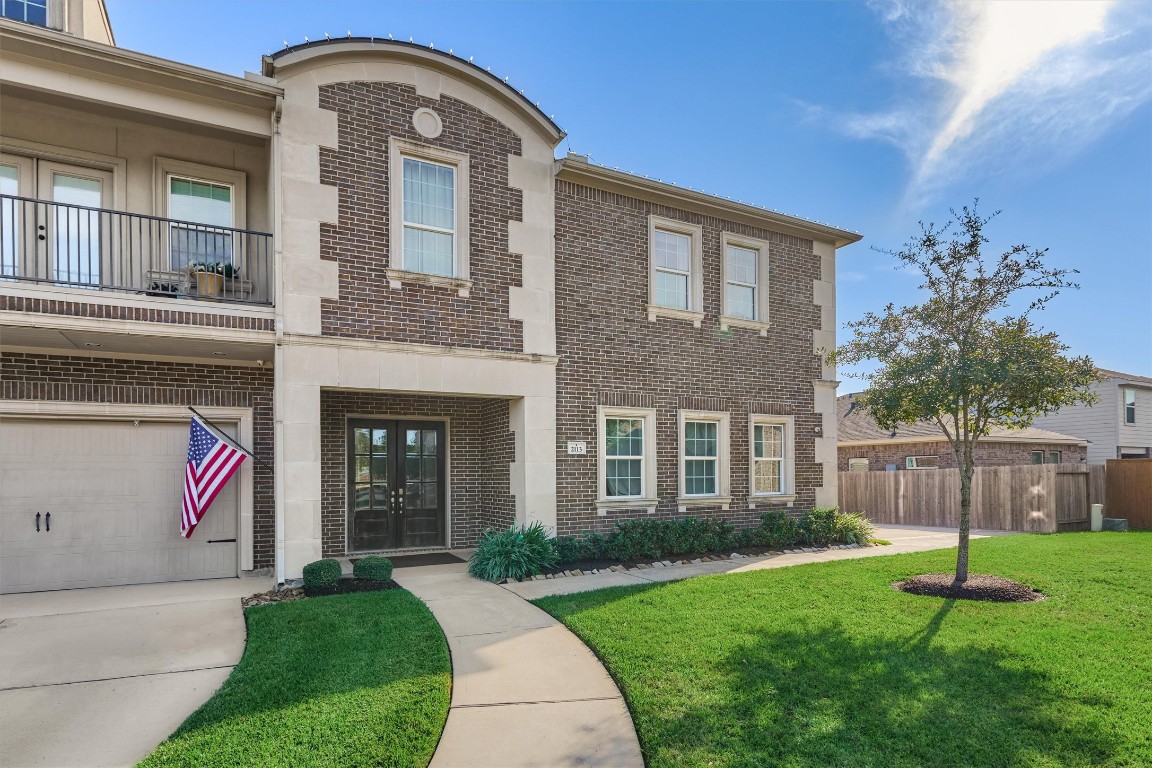 2113 Solstice Boulevard Spring, TX 77386 - Photo 7 of 50 a front view of a house with garden