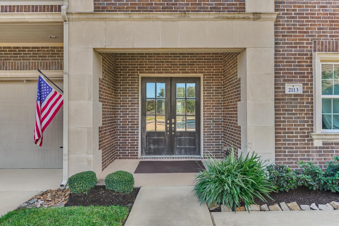 2113 Solstice Boulevard Spring, TX 77386 - Photo 8 of 50 a front view of a house with plants