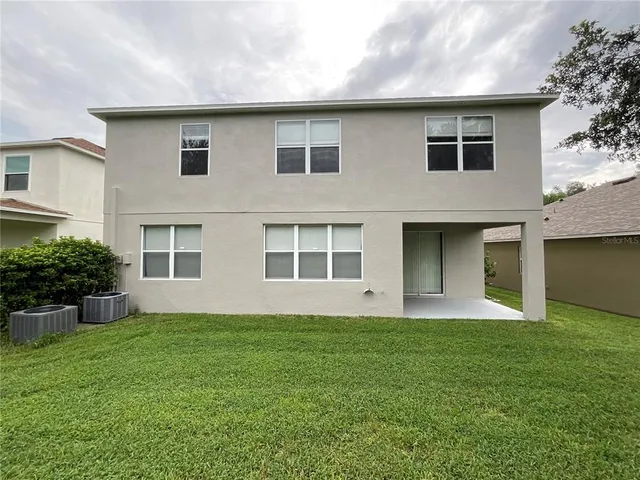 a view of a golf course with a lake