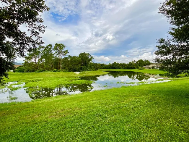 a view of a hallway with front door