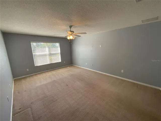 a view of a livingroom with wooden floor