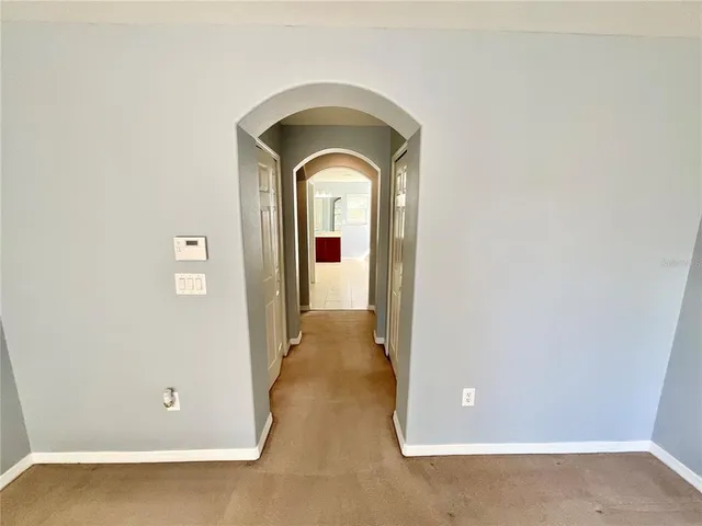 a bathroom with a tub and shower