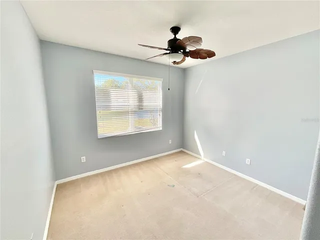 a bathroom with a toilet and a bathtub