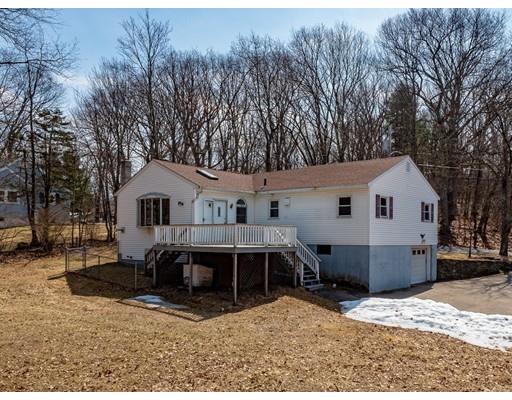 105 Hartness Road Sutton, MA 01590 - Photo 2 of 20 front view of a house with a yard