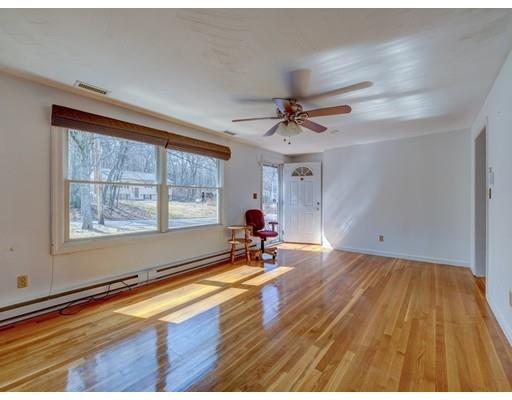 105 Hartness Road Sutton, MA 01590 - Photo 6 of 20 a room with wooden floor and window