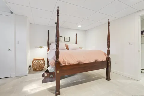 a bathroom with a shower and a sink