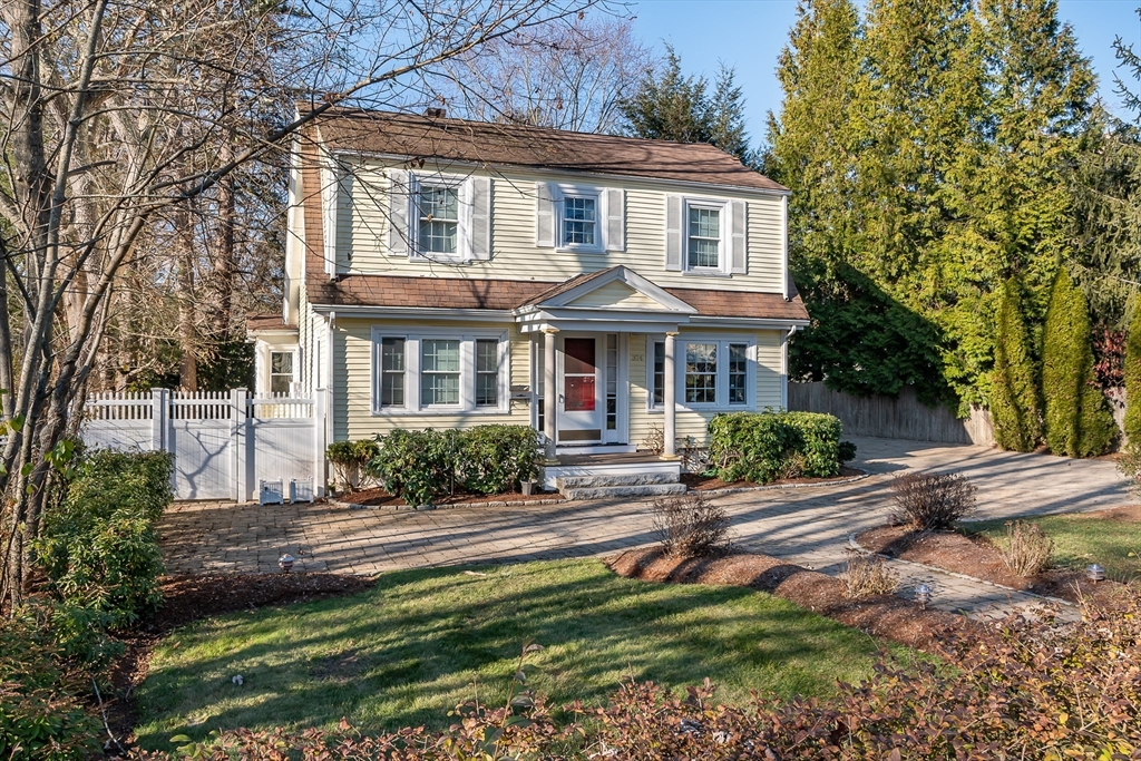 374 Weston Road Wellesley, MA 02482 - Photo 1 of 21 a front view of a house with a yard