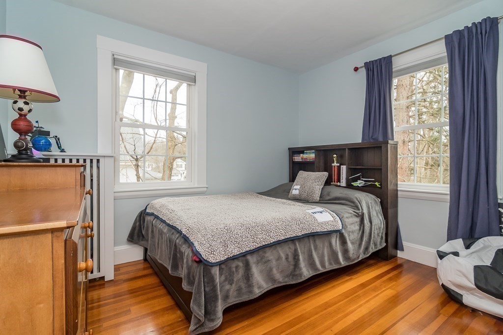 374 Weston Road Wellesley, MA 02482 - Photo 12 of 21 a bedroom with a bed and window