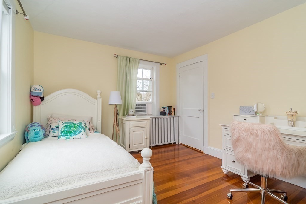 374 Weston Road Wellesley, MA 02482 - Photo 13 of 21 a room with a bed and a dresser